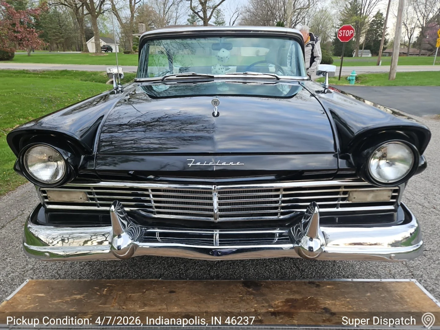 Front view of a black classic Ford Fairlane.